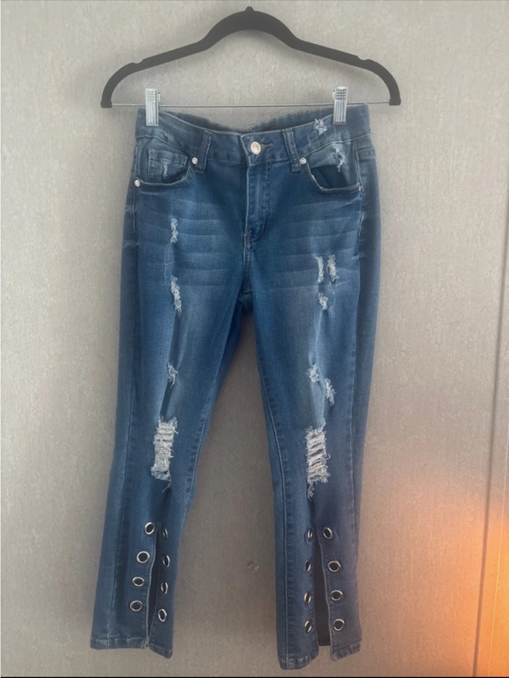 Dark Blue Distressed Jeans with Grommet Hem